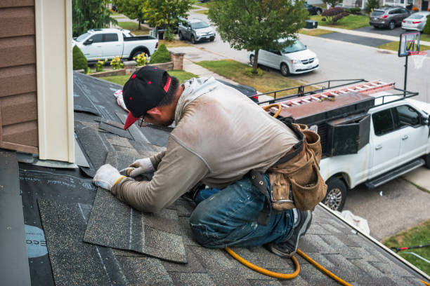 Professional Roofing technician working in Wilmington, IL